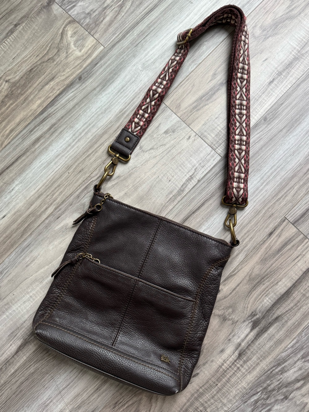 The Sak Lucia Crossbody Brown Leather Bag with Guitar-Style Strap